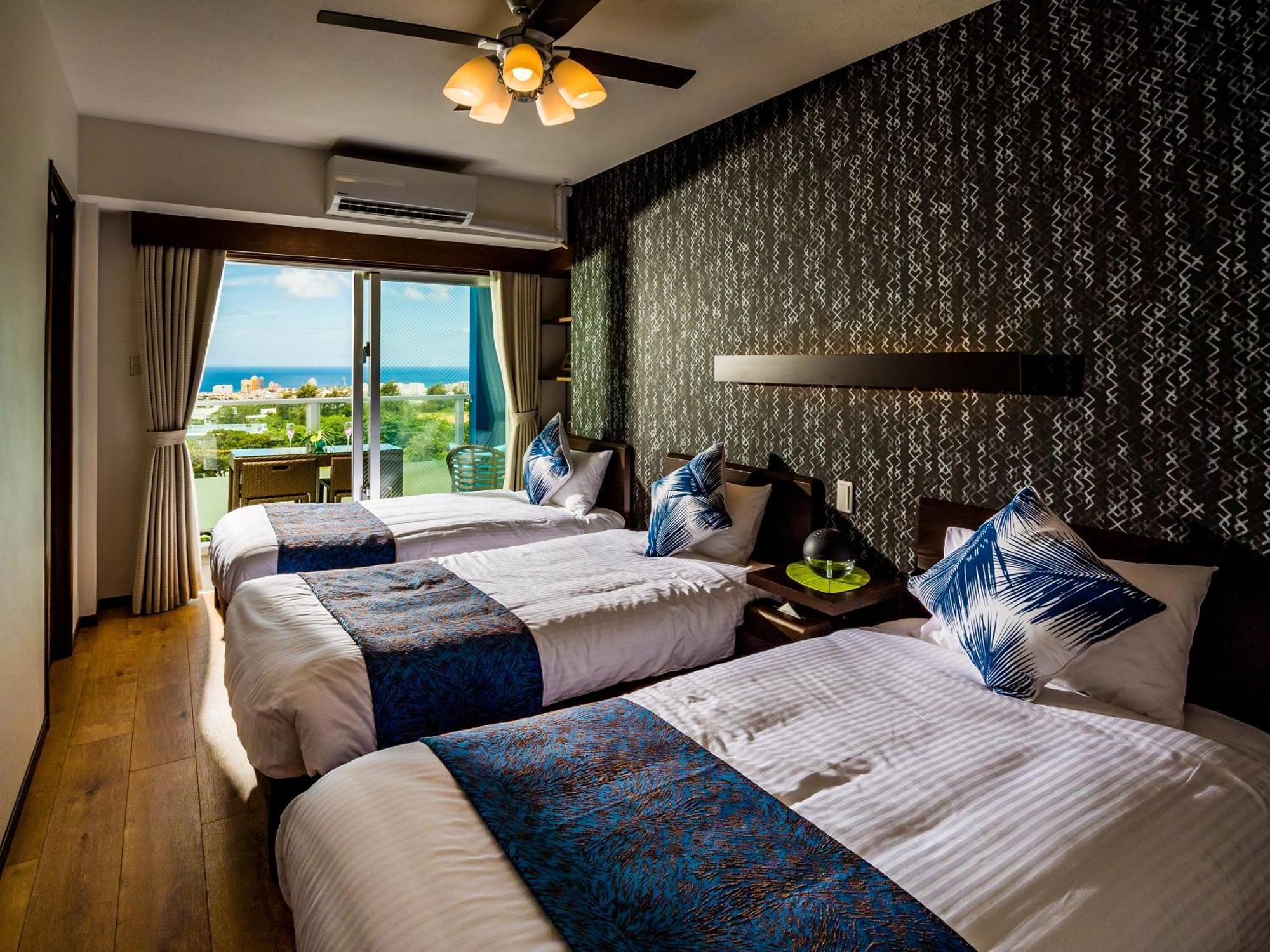 โซอี้ รีสอร์ต เดอะ ซันเซ็ต วิลเลจ โอกินาวา ชะตัง Apartment ชาตัน ภายนอก รูปภาพ